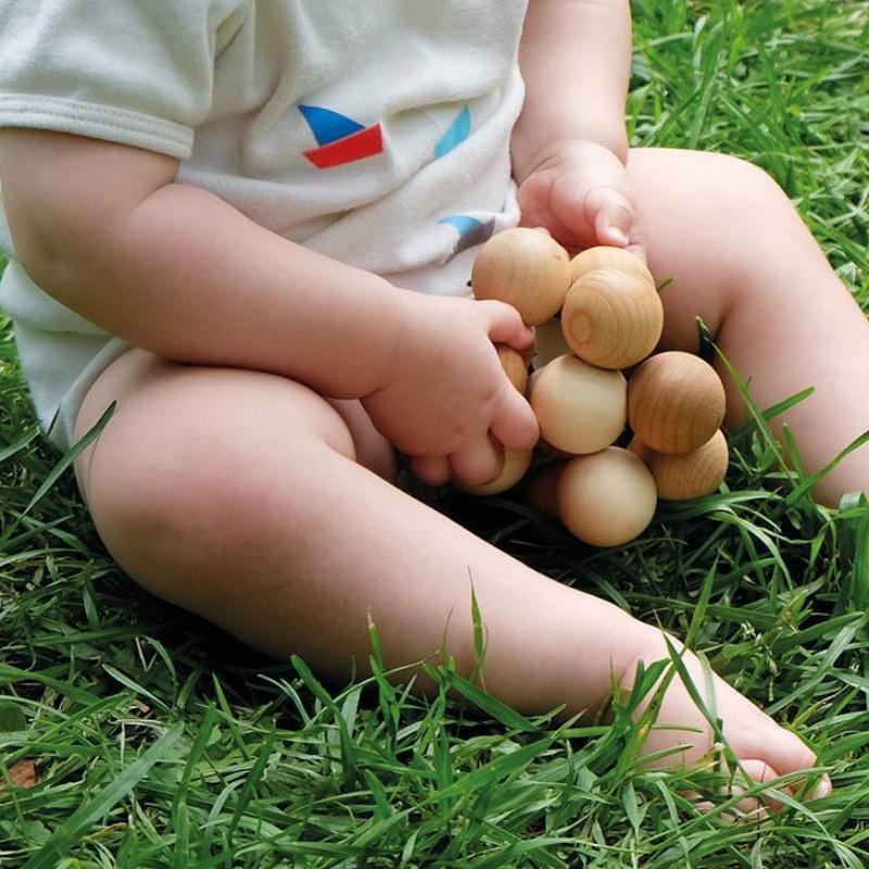 Wooden baby toys are made to amuse and