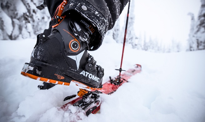 A collection of ski boots with a unique