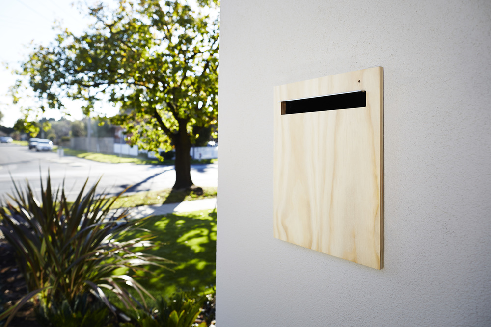 This is essentially a wall mounted letterbox, but